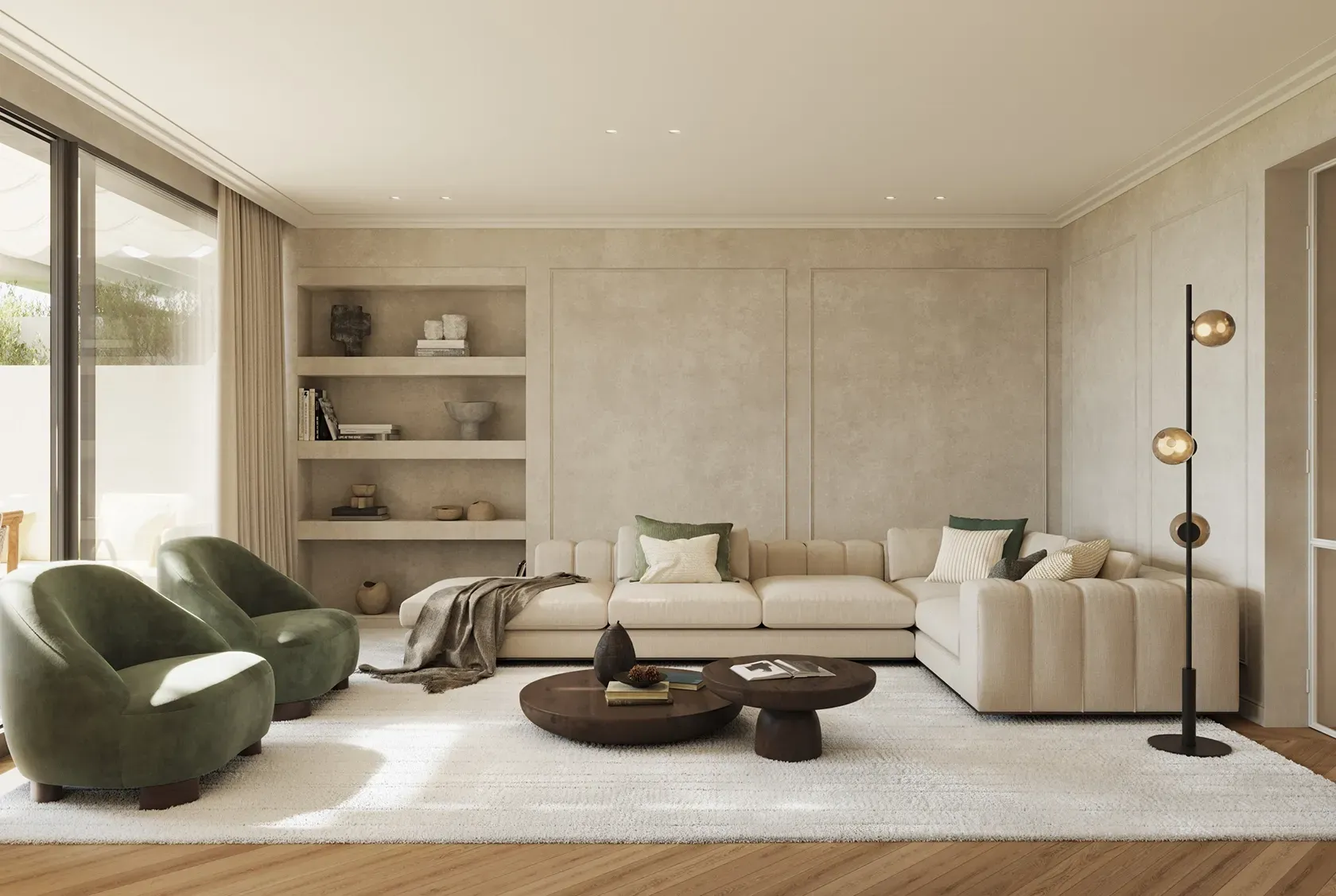 Refined living room with a modular cream sofa, green velvet armchairs and built-in shelves, styled with organic textures and soft natural light.