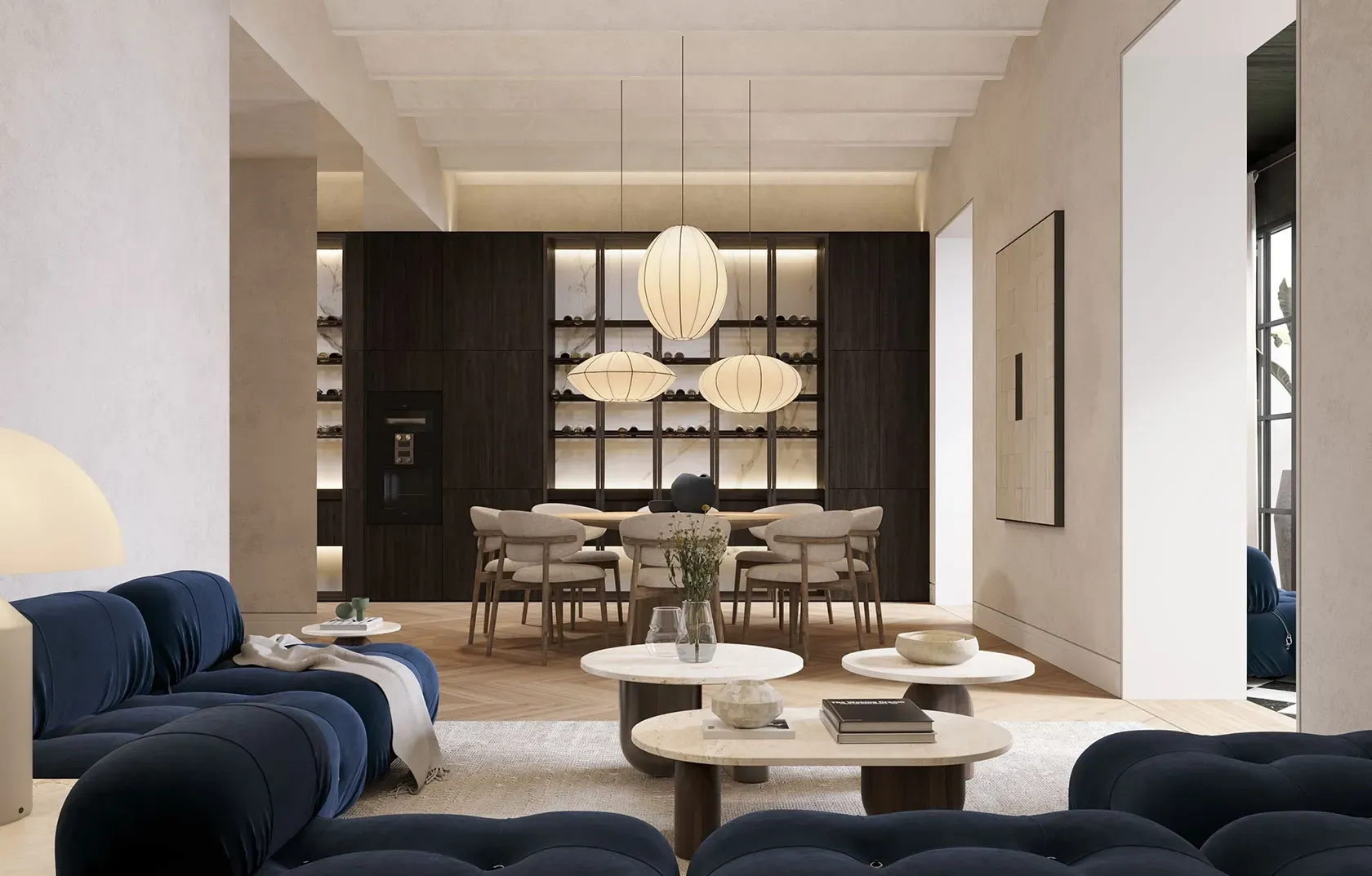 Sophisticated living and dining area with sculptural lighting, dark wood cabinetry, and modern luxury design details.