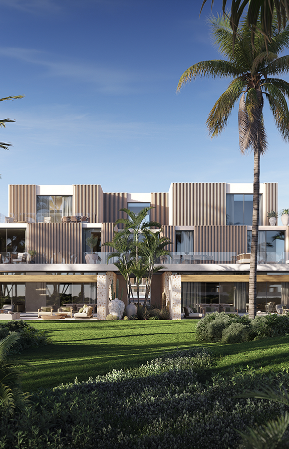 Chalets with private patios and open façades overlooking the Mediterranean.