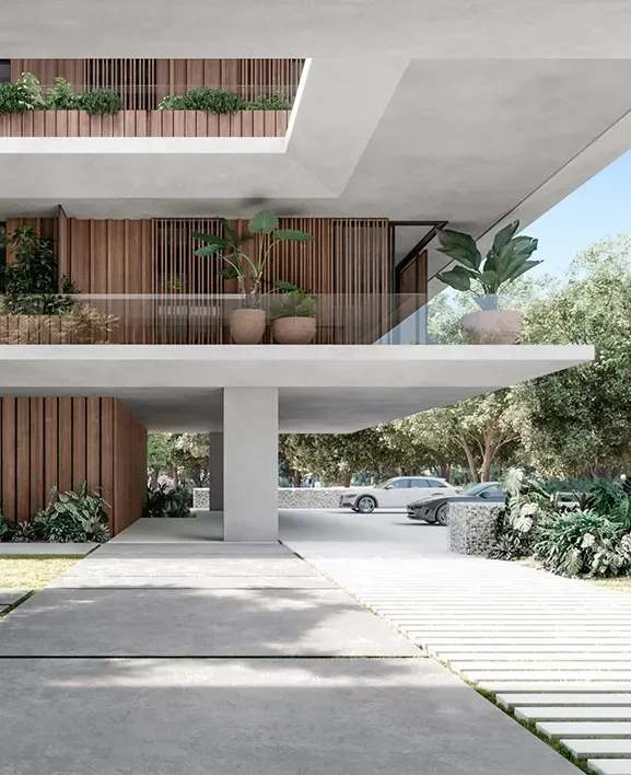 Open-air ground level of a luxury residence by LUV Studio, featuring minimalist concrete structure, wood paneling, and lush landscaping.
