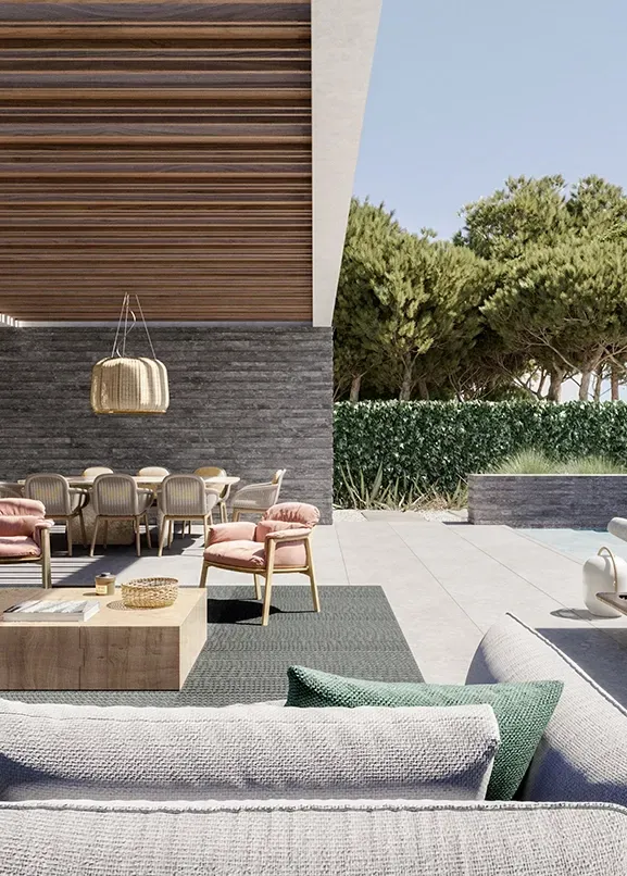 Contemporary outdoor lounge and dining area under wooden pergola next to a pool.