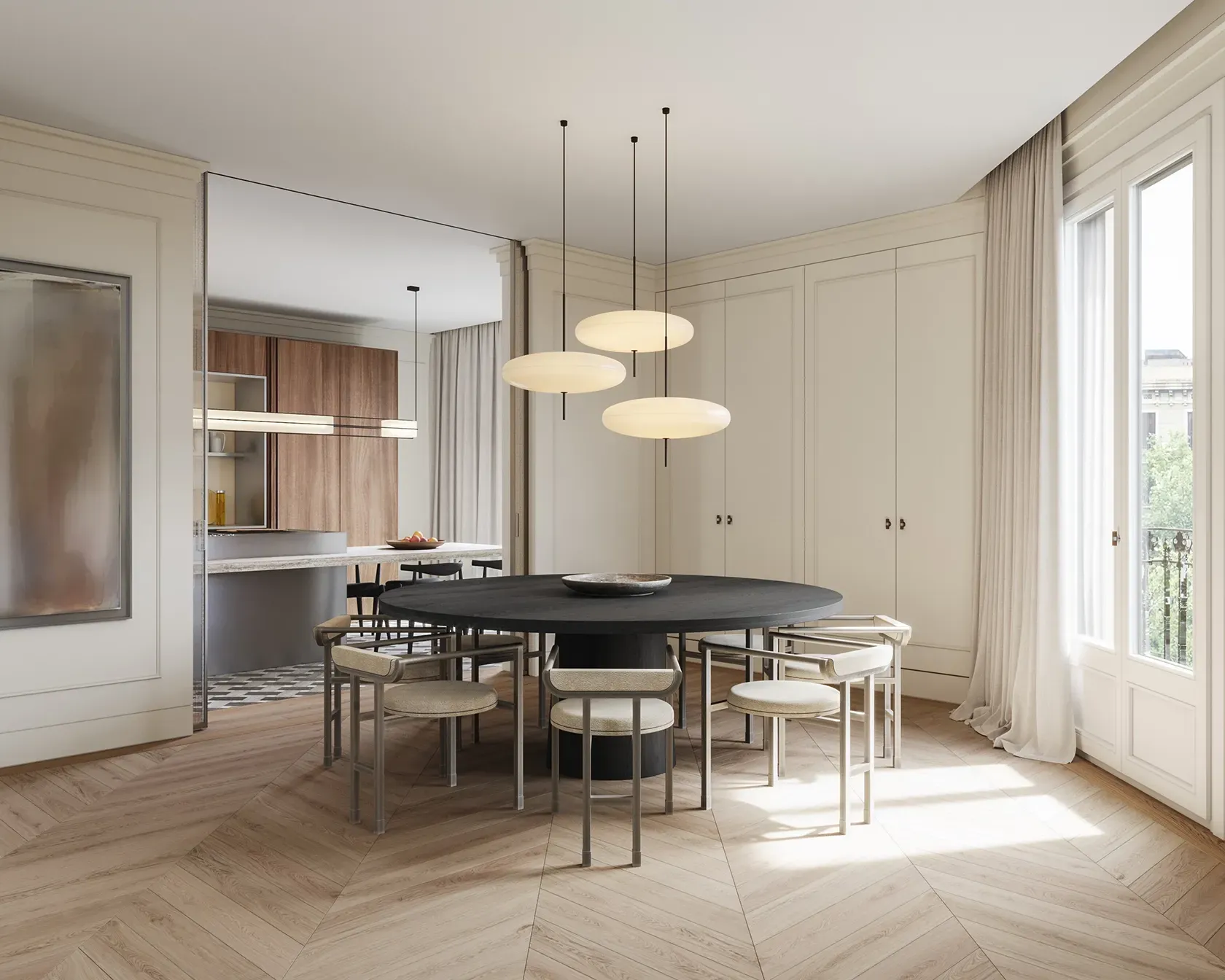 Elegant dining area with a large round black table, cream walls, soft drapes, and pendant lighting.