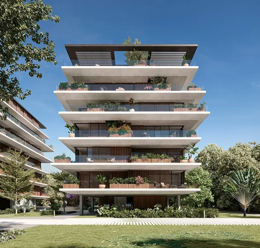 Detailed front view of LUV Studio’s luxury apartment building with layered terraces, wood accents, and abundant greenery under a clear blue sky.