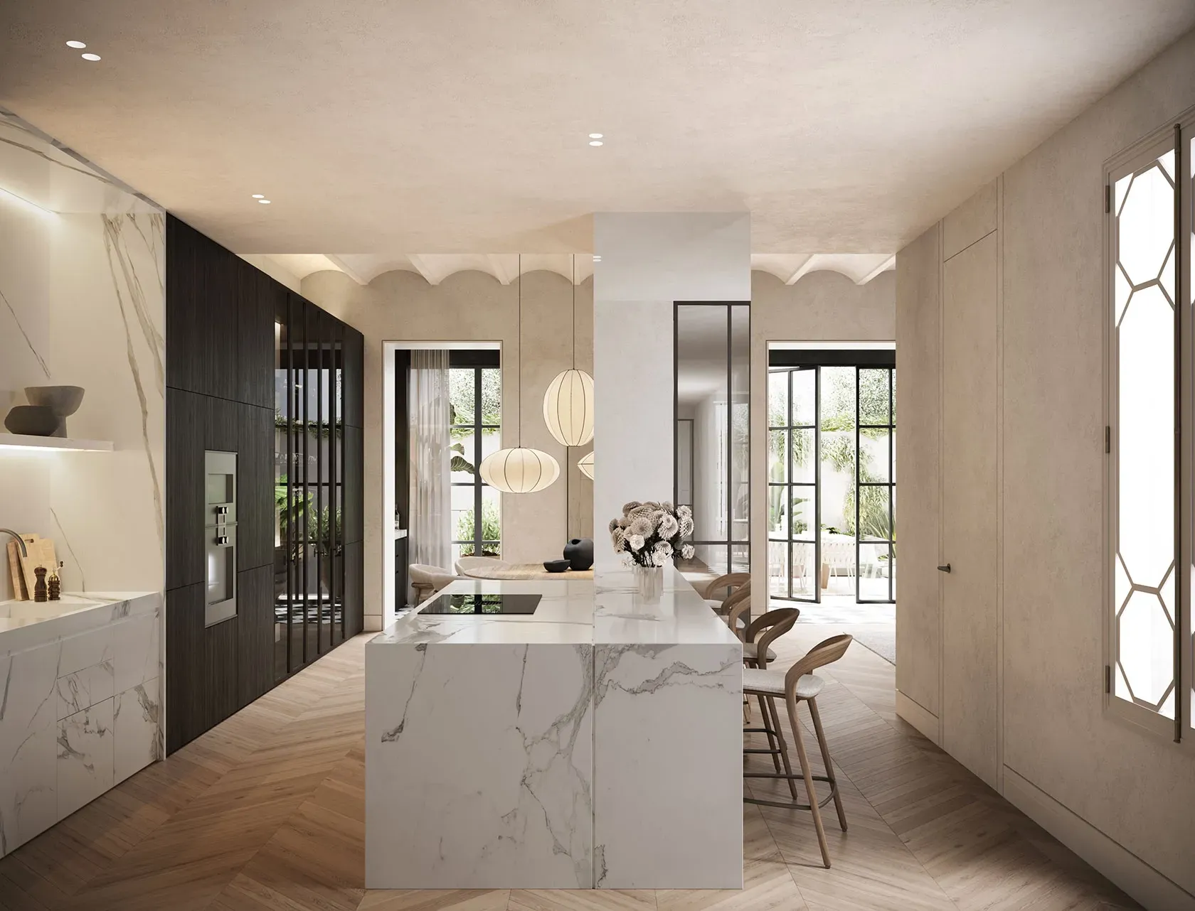 Elegant luxury kitchen with marble island, integrated lighting, and seamless connection to a bright outdoor patio.
