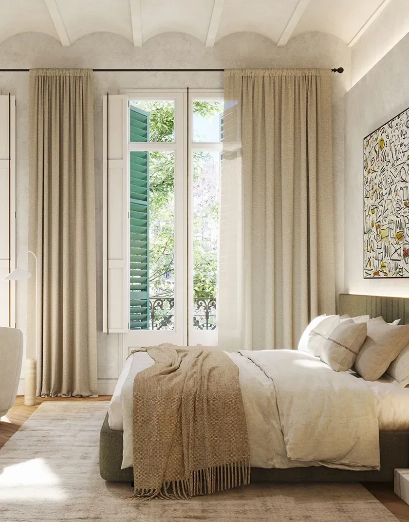 Tranquil bedroom suite with soft neutral tones, high ceilings, and tall windows opening to lush green views.