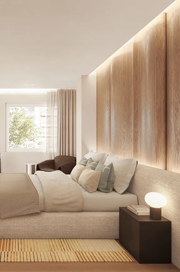 Cozy bedroom with natural materials and a serene, luminous atmosphere.