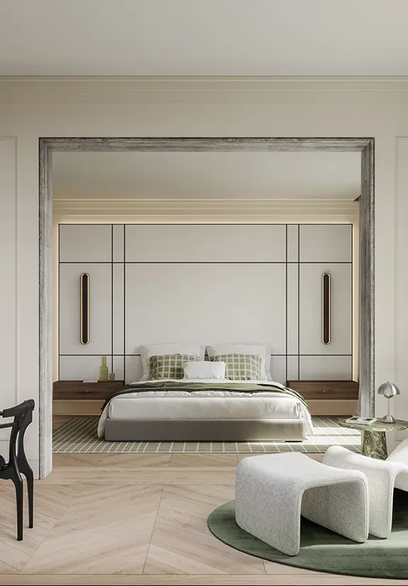 Calm bedroom suite with modern lounge chair, green accents, and seamless connection to the workspace.