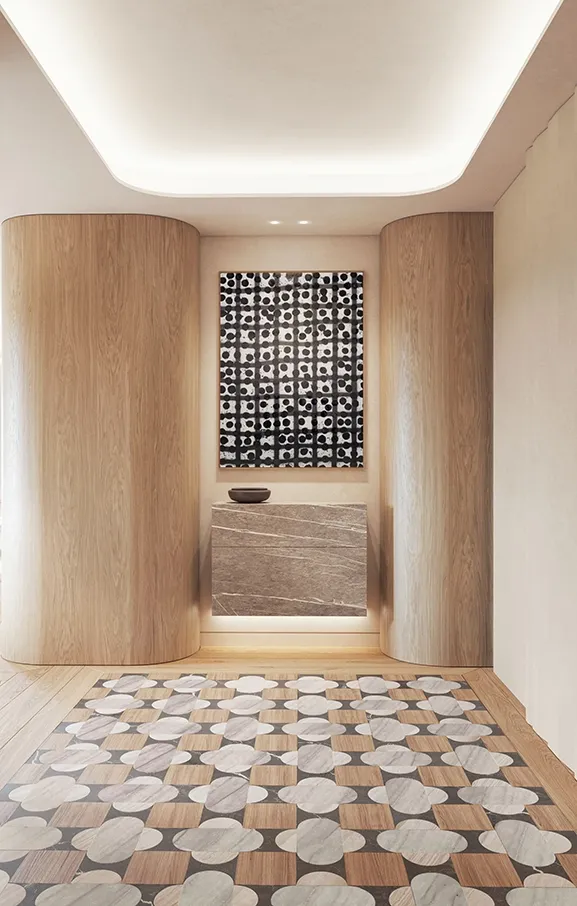 Welcoming entryway featuring a mosaic floor, setting the tone for refined design.