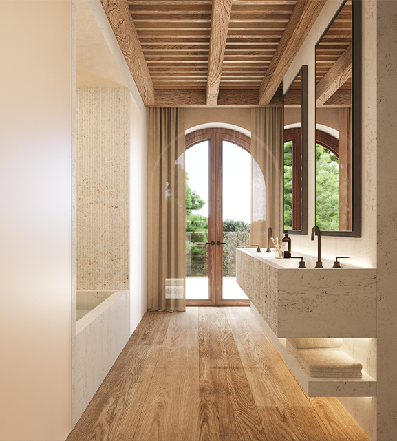 Refined bathroom with floating stone sink, wooden ceiling beams, and arched doors opening to nature, showcasing luxury and architectural warmth.
