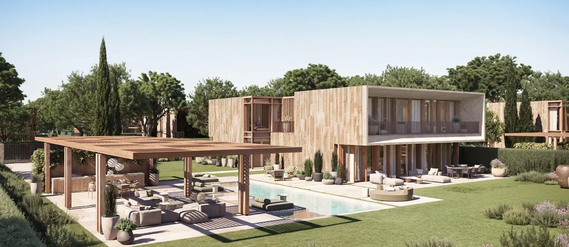 Architectural perspective of Bale Villas showing modern volumes, natural textures, and a seamless garden integration.