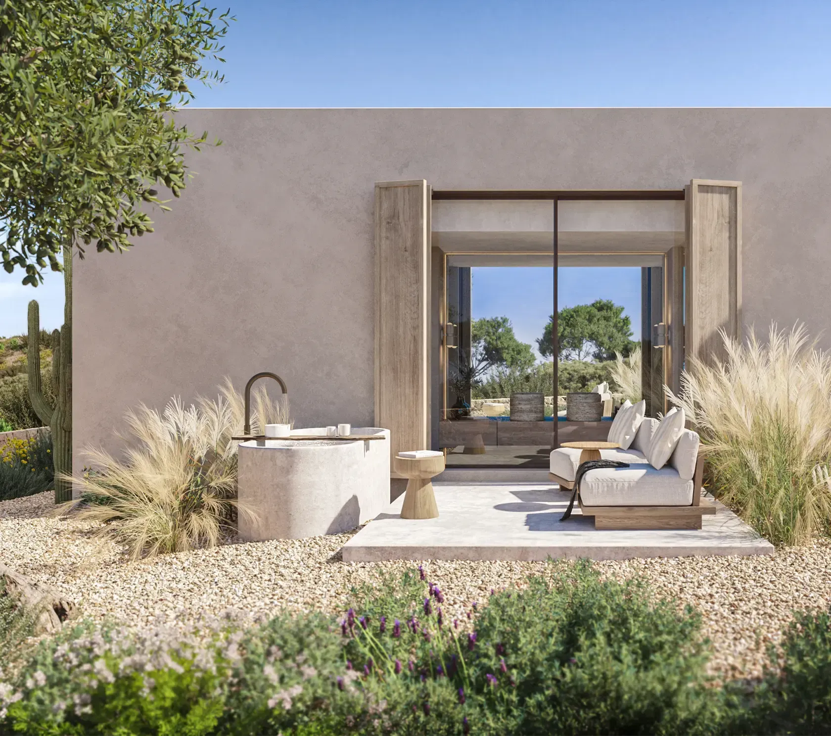 Outdoor bathtub with sea views and privacy walls, integrating luxury wellness into coastal architecture.