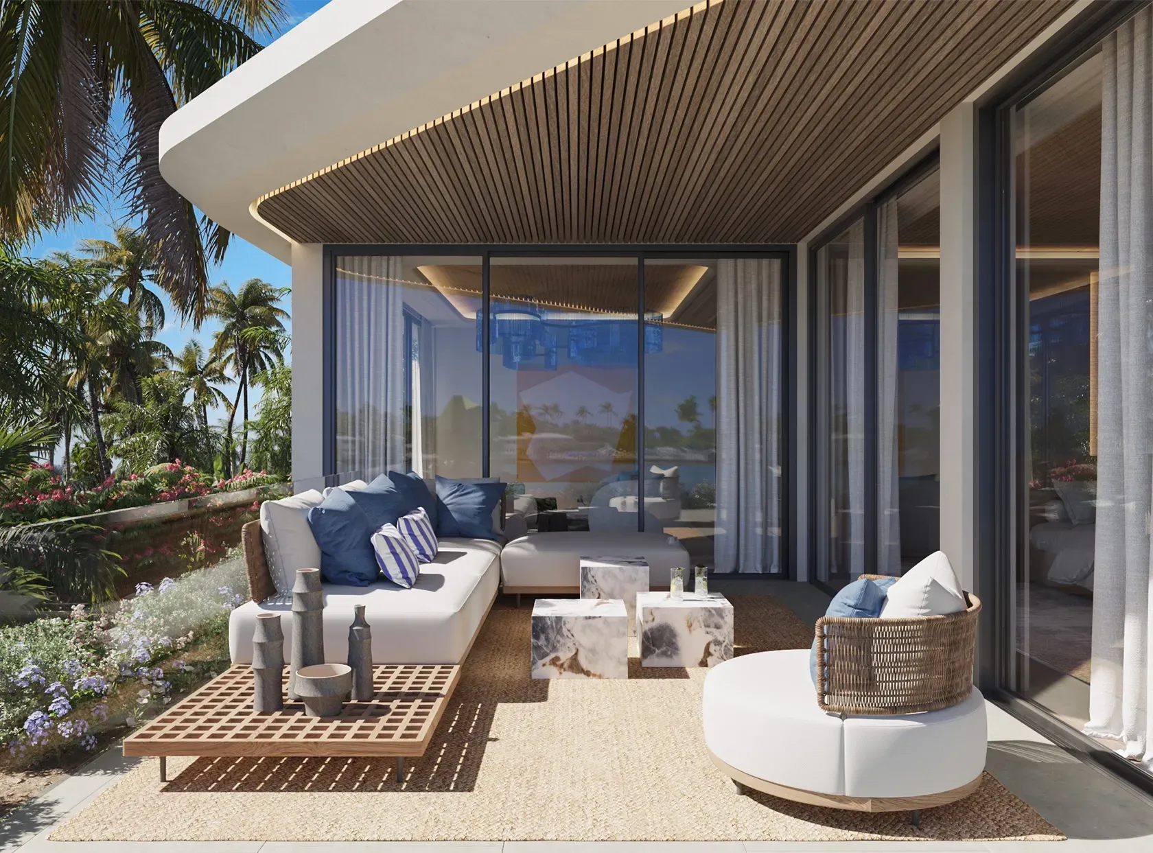 Cozy outdoor terrace with modern lounge furniture, tropical landscaping, and elegant ceiling architecture.