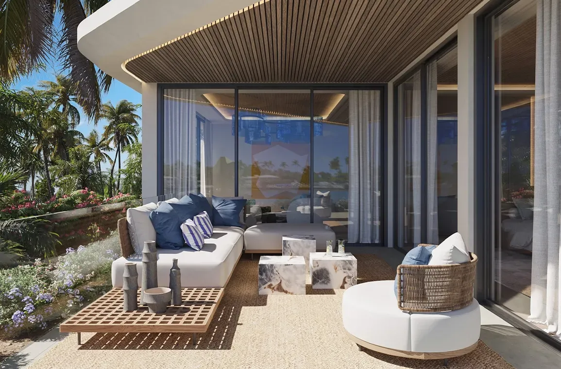 Cozy outdoor terrace with modern lounge furniture, tropical landscaping, and elegant ceiling architecture.
