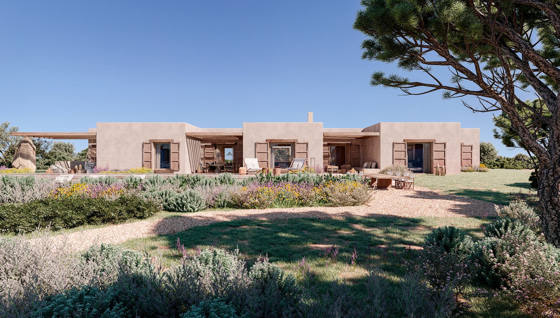 Exterior view of LUV Studio’s Villa Formentera, showcasing minimalist Mediterranean architecture surrounded by native landscaping.