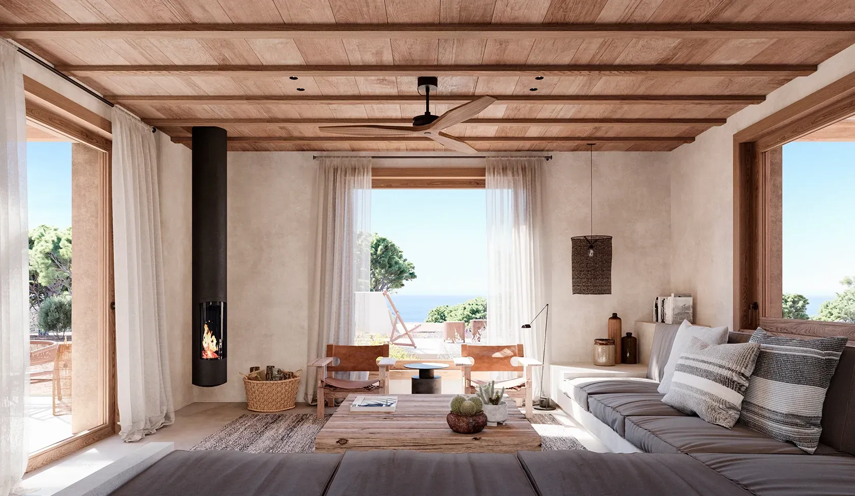 Cozy living room with custom sofa, natural textures, and sea view, in a LUV Studio Formentera home.