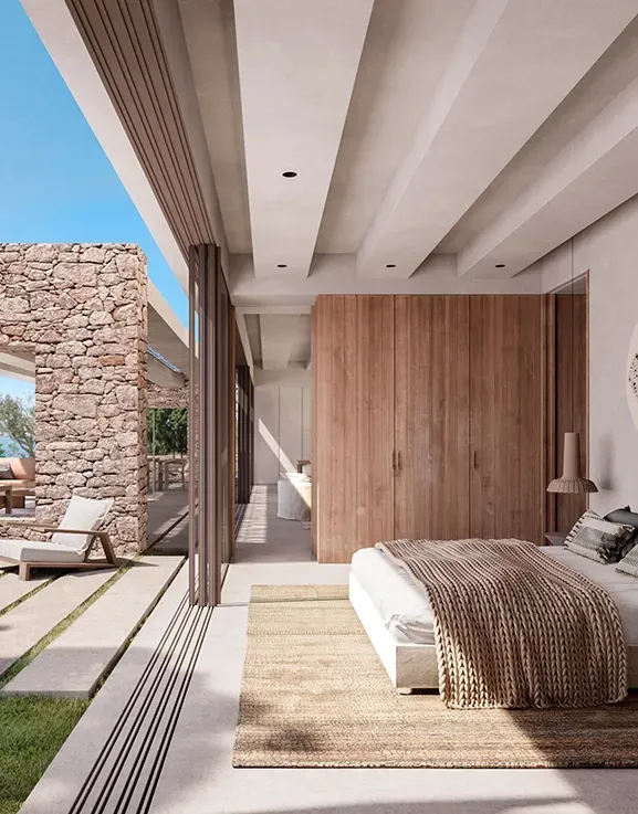 Elegant bedroom with natural textures, wood paneling and ocean view, blending indoor and outdoor space.