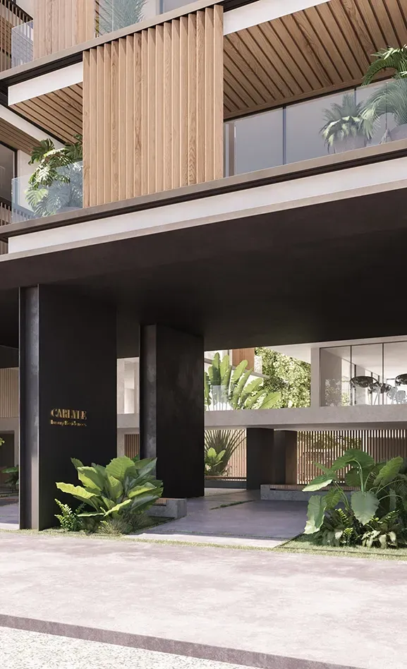 Modern architectural entrance of Carlyle luxury residence surrounded by tropical landscaping