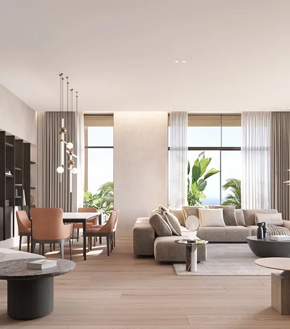 Spacious luxury living and dining area with large windows and ocean views at Carlyle residence