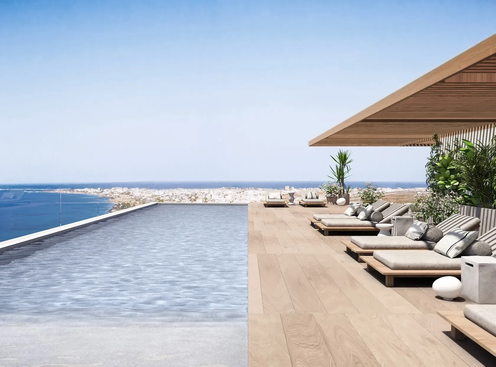 Luxury architectural entrance of Carlyle with lush landscaping and vertical wood elements