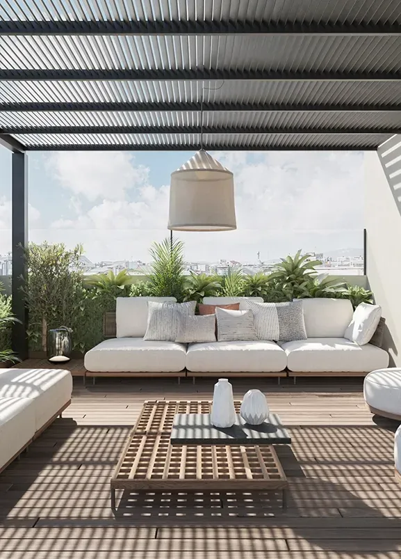 Covered rooftop lounge with cozy seating and panoramic city views in a luxury urban apartment.