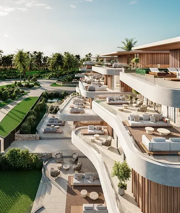 Aerial view of cascading terraces surrounded by palm trees and landscaped gardens.