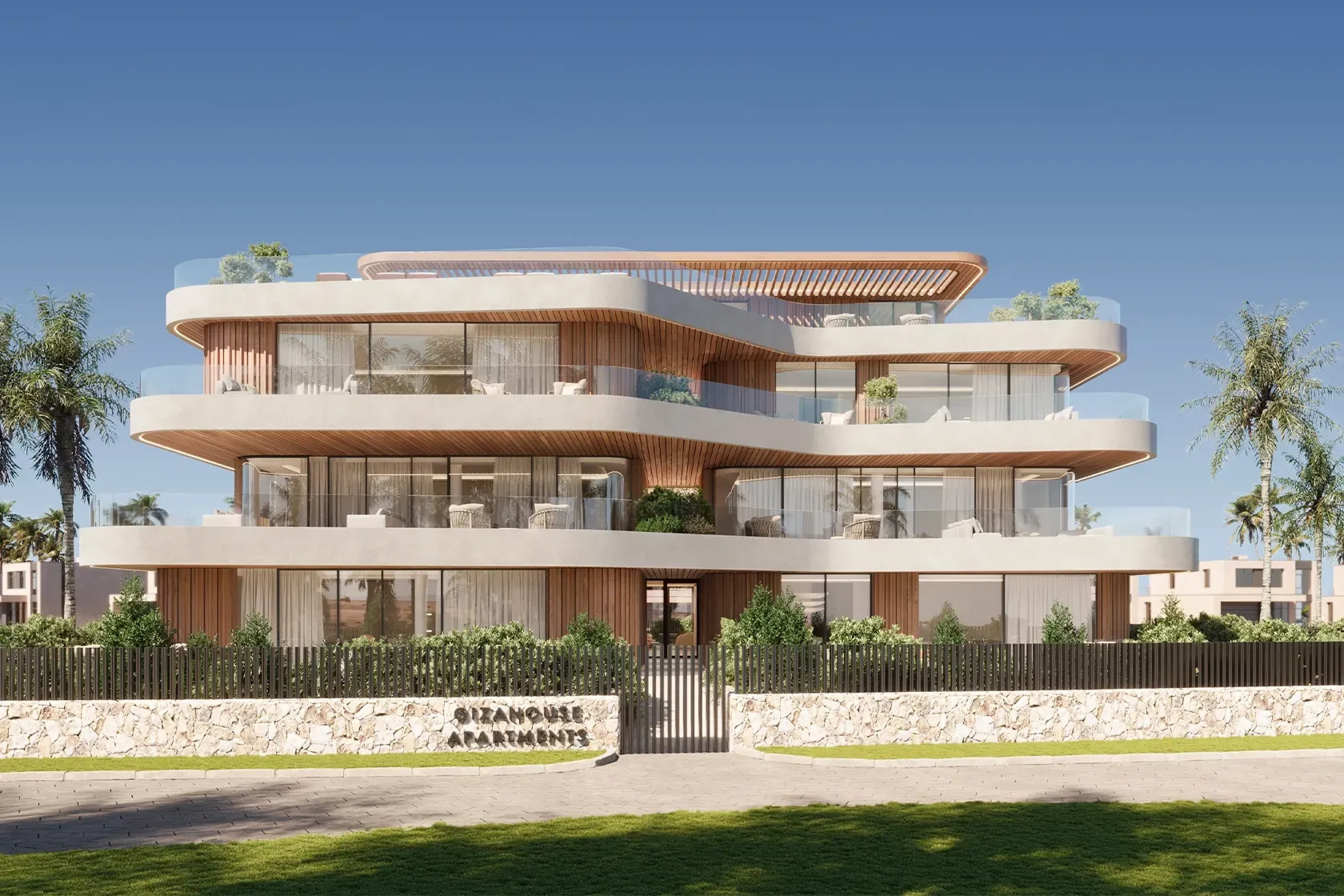 Frontal view of the full residential building with organic lines and Mediterranean landscaping.