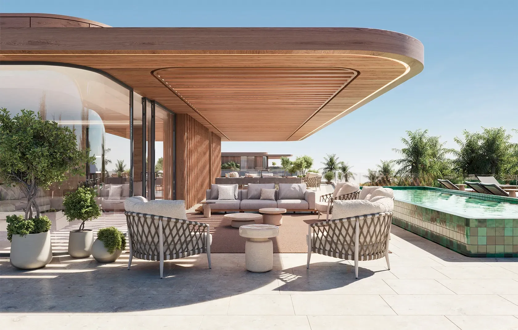 Penthouse terrace with pool, shaded lounge area and panoramic views of the surrounding landscape.