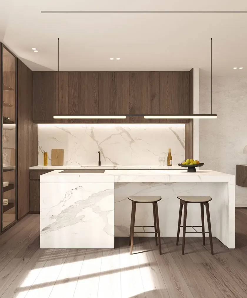 Minimalist kitchen with dark wood cabinets and marble island, featuring clean lines, ambient lighting and refined textures by LUV Studio.