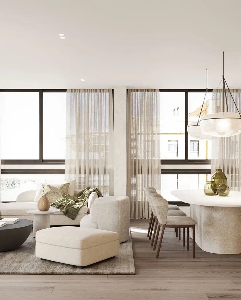 Spacious living and dining area with custom furniture, curved white sofa, and natural light, designed in soft neutrals and Mediterranean tones.