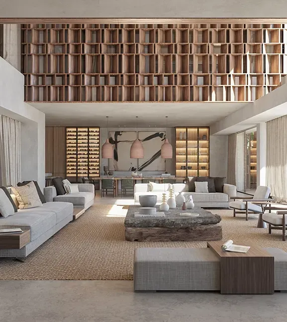 Contemporary living room with large windows, custom shelving, and natural tones, showcasing luxury design in a Punta Cana beachfront home.
