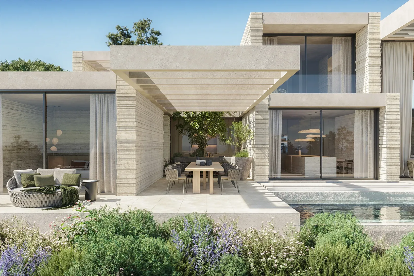 Modern luxury pergola and dining space seamlessly integrated with the villa’s architectural design and natural surroundings.