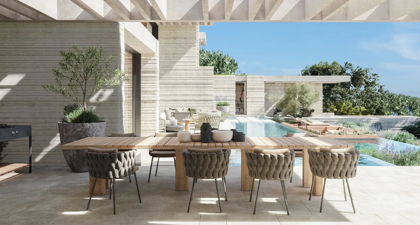 Outdoor dining area with pergola, poolside seating and elegant modern architecture surrounded by Mediterranean garden.