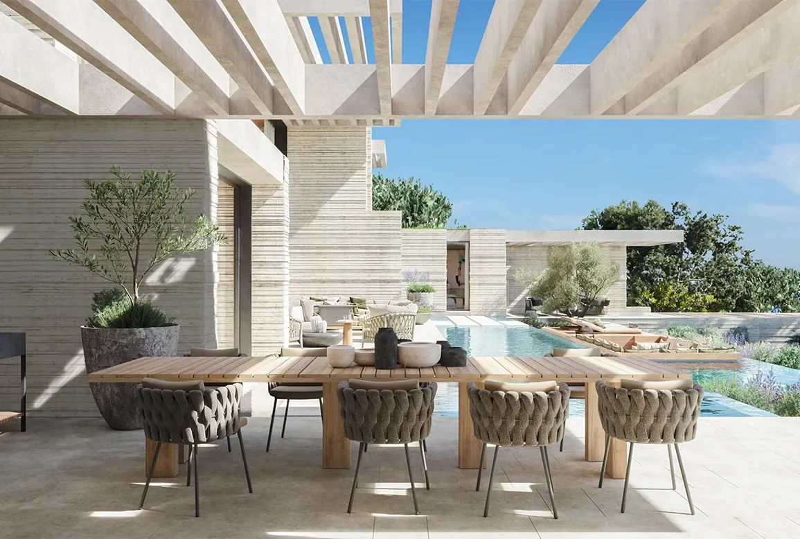 Outdoor dining area with pergola, poolside seating and elegant modern architecture surrounded by Mediterranean garden.