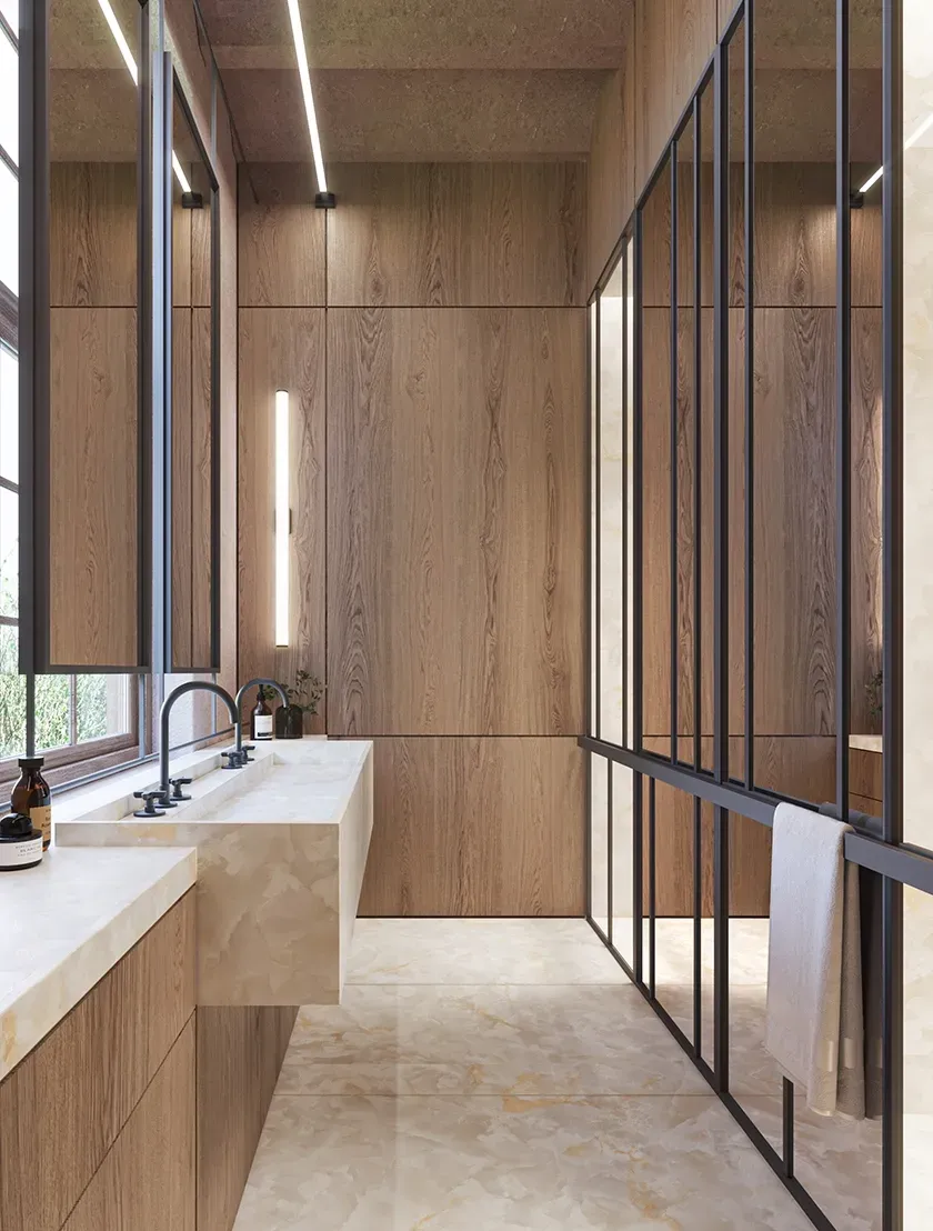 Elegant bathroom with onyx sinks and wood paneling, designed by Luv studio in a luxury architectural style.