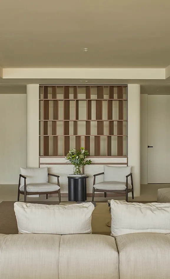 Contemporary living room with modular sofa, custom shelving, and Mediterranean calm atmosphere
