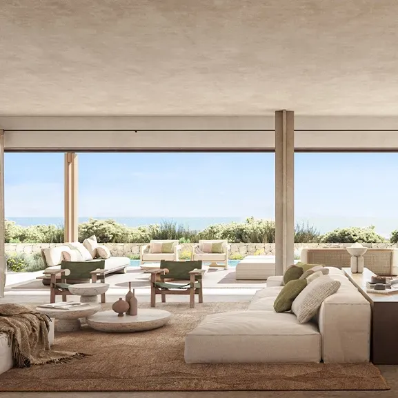 Sun-drenched living space featuring clean architectural lines, warm textures, and direct views of nature.