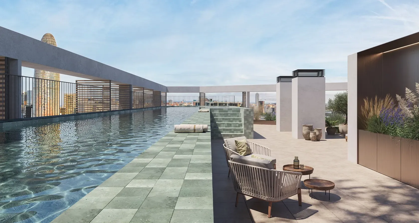 Rooftop pool with panoramic views of Barcelona, surrounded by natural stone finishes, modern loungers, and lush greenery in a serene urban oasis.