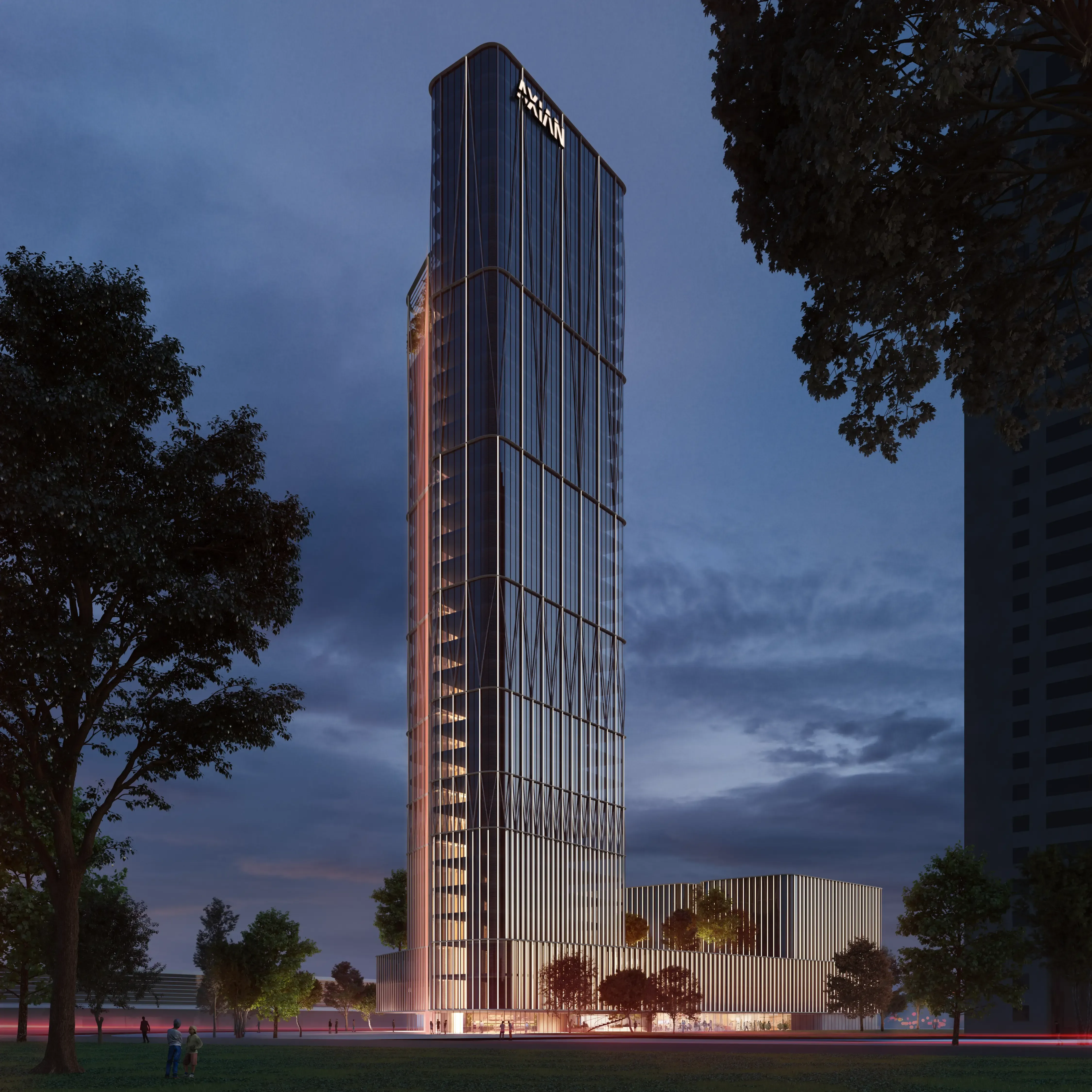 Night view of a sleek Luv studio skyscraper with warm lighting showcasing luxury architectural design.
