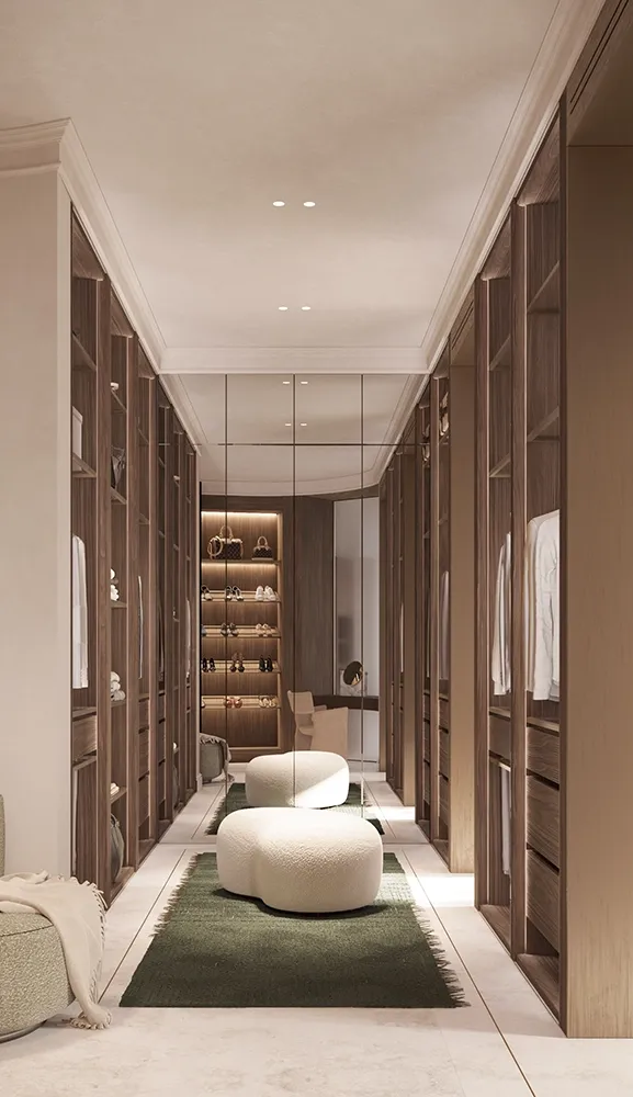 Dressing room with bespoke cabinetry and soft natural light.