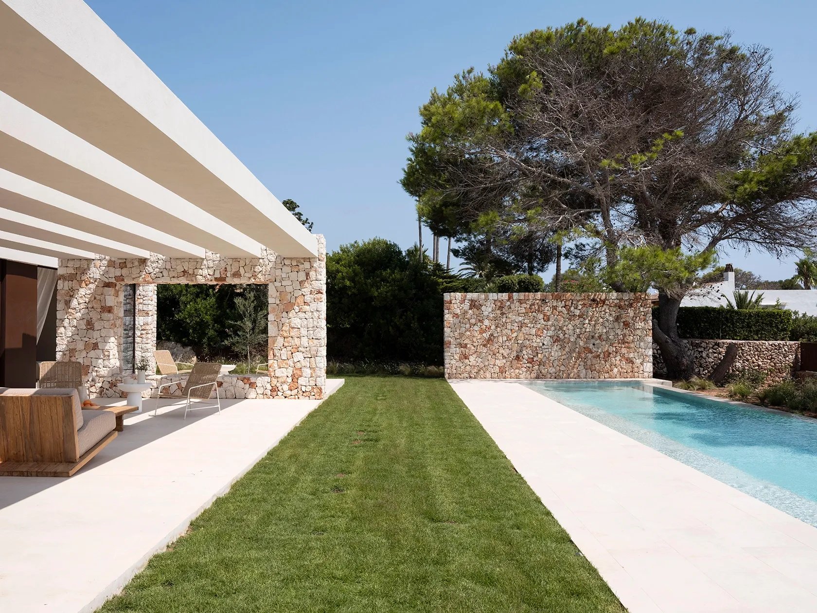 A serene pool extending towards the horizon.