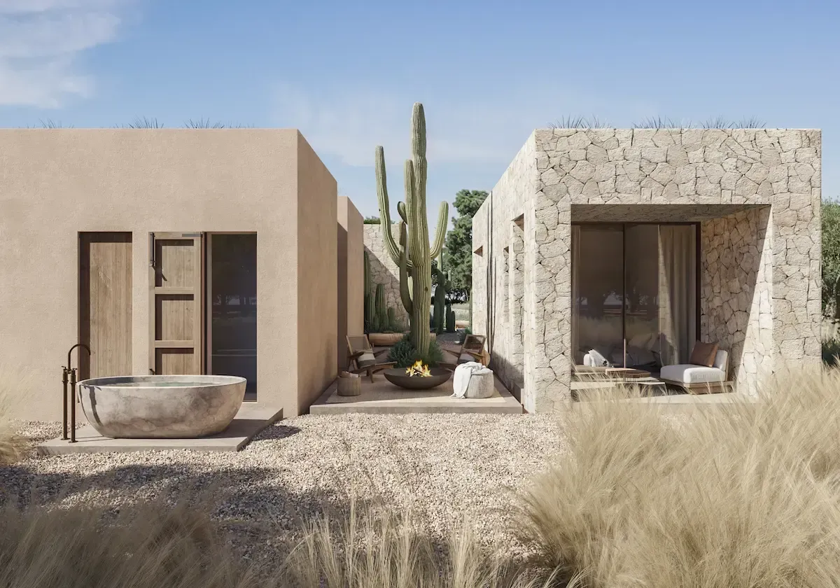 Infinity pool and cactus courtyard between two volumes of the contemporary Formentera villa by Luv studio.