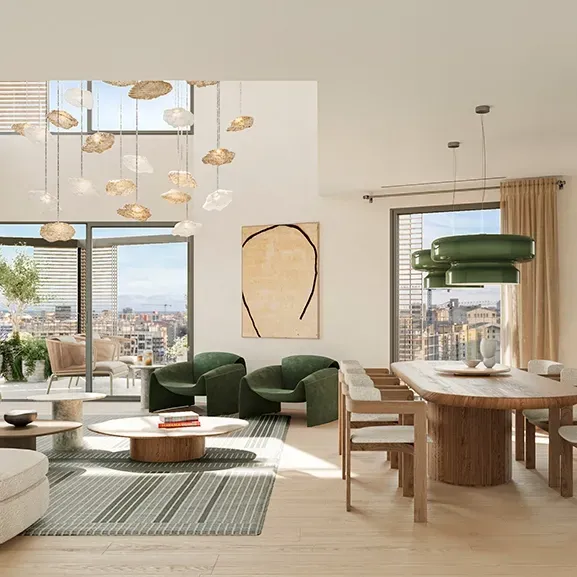 Double-height living room with sculptural lighting, bold green armchairs, and expansive views from terrace-level windows.