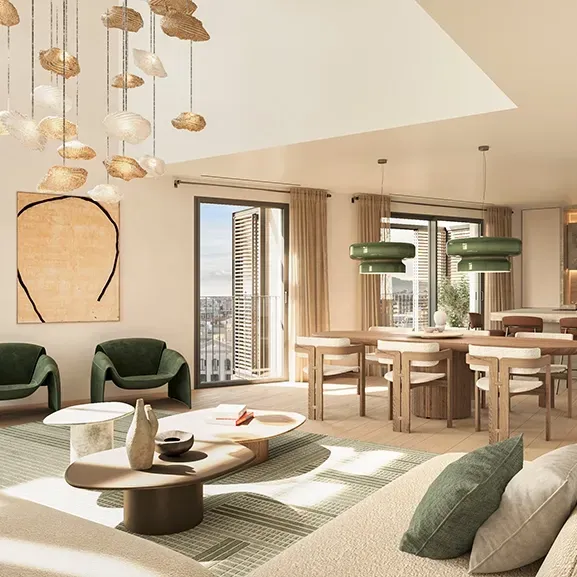 Open-concept living and dining area with natural light, green pendant lamps, textured finishes, and a connection to the terrace.