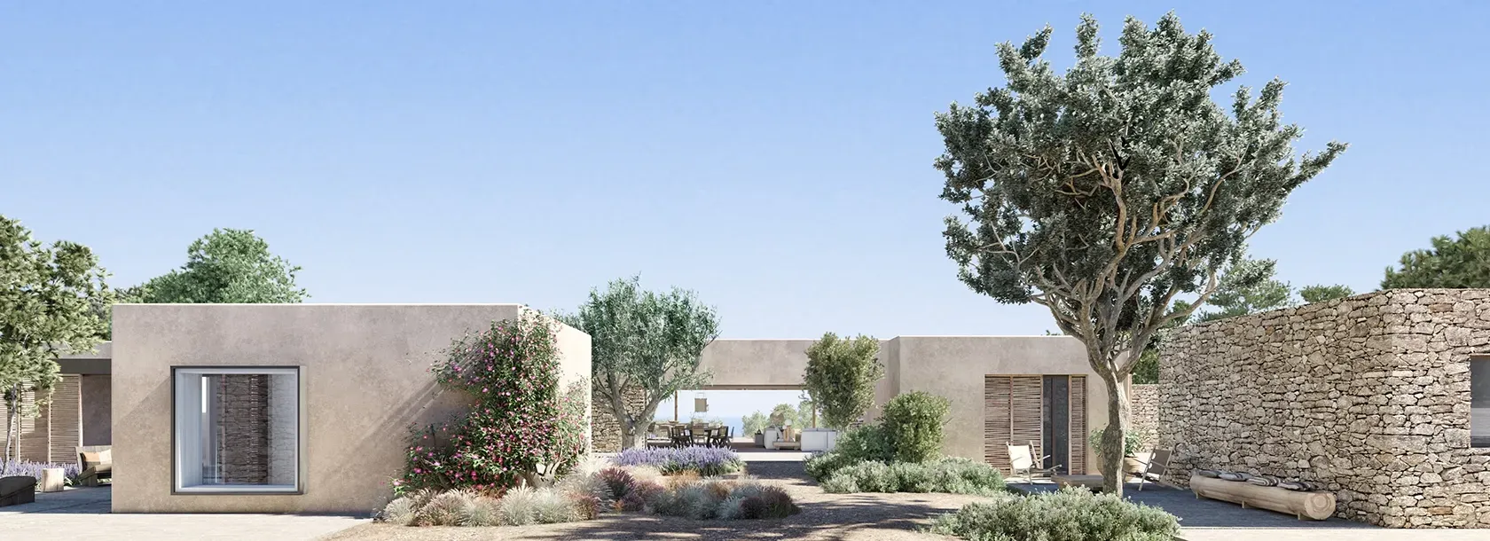 Modern stone and stucco villa façades surrounded by native trees and minimalist garden design in Ibiza.