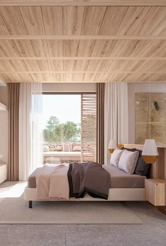 Elegant bedroom with wooden ceiling, stone flooring and integrated terrace in a LUV Studio-designed villa.