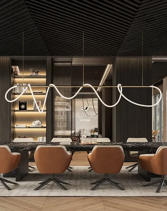 Sophisticated boardroom with black marble table and tan leather chairs in LUV Studio's luxury Andorra office.