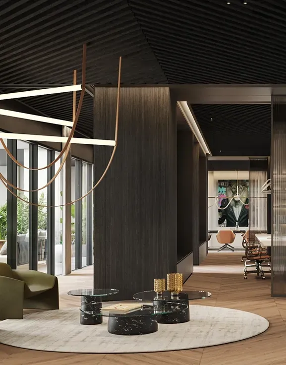 Open office entrance with marble desk and custom shelving at LUV Studio’s luxury Andorra headquarters.