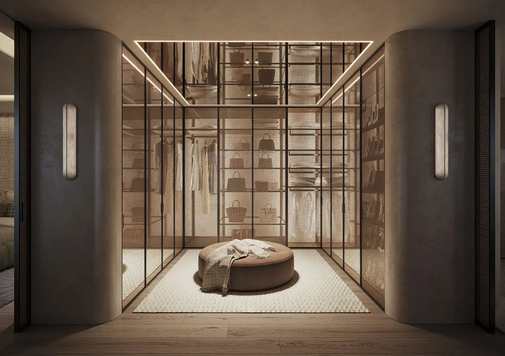 Open-plan living space with modern lighting, sleek furnishings and a soft, neutral palette.
