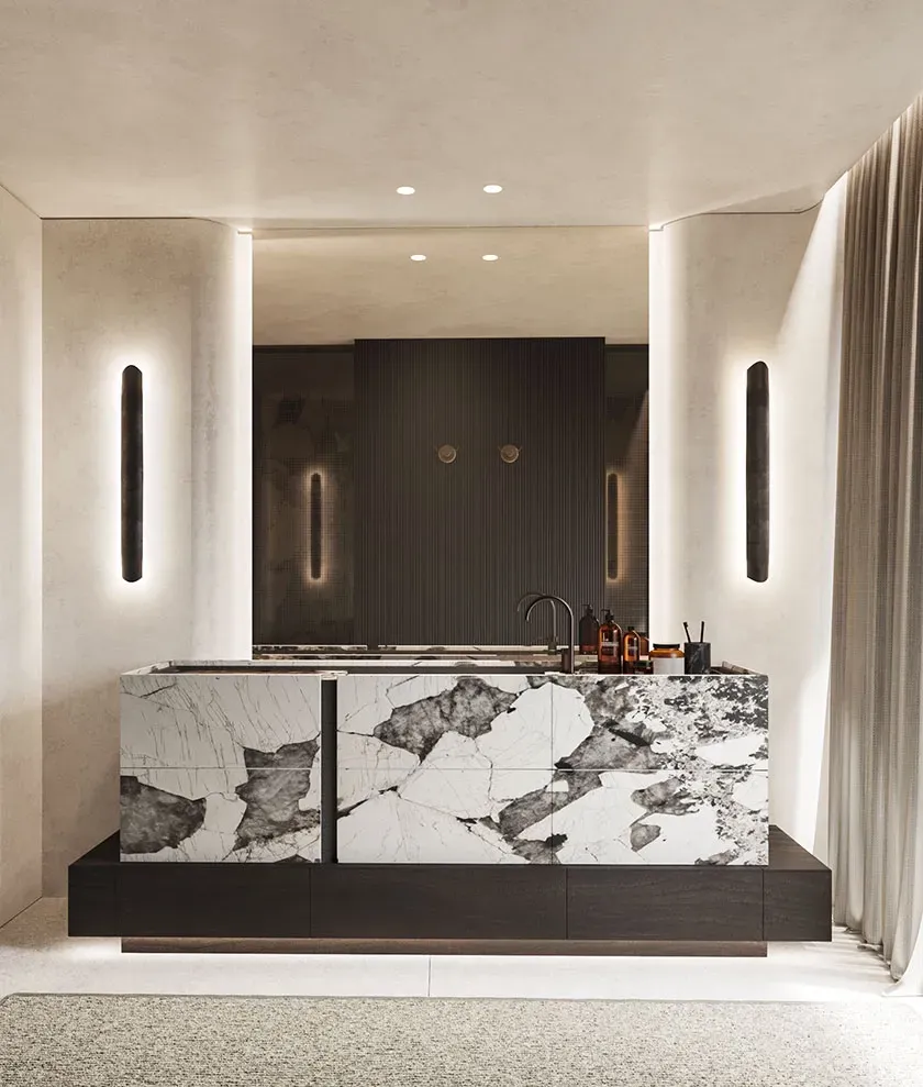 Luxury bathroom vanity with bold marble textures and minimalist lighting, reflecting refined contemporary architecture.