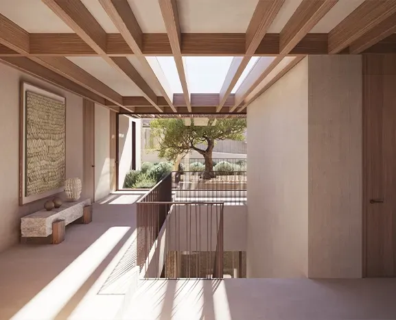 Refined hallway with vaulted ceiling, terracotta flooring, and warm tones enhancing the luxury architectural design.